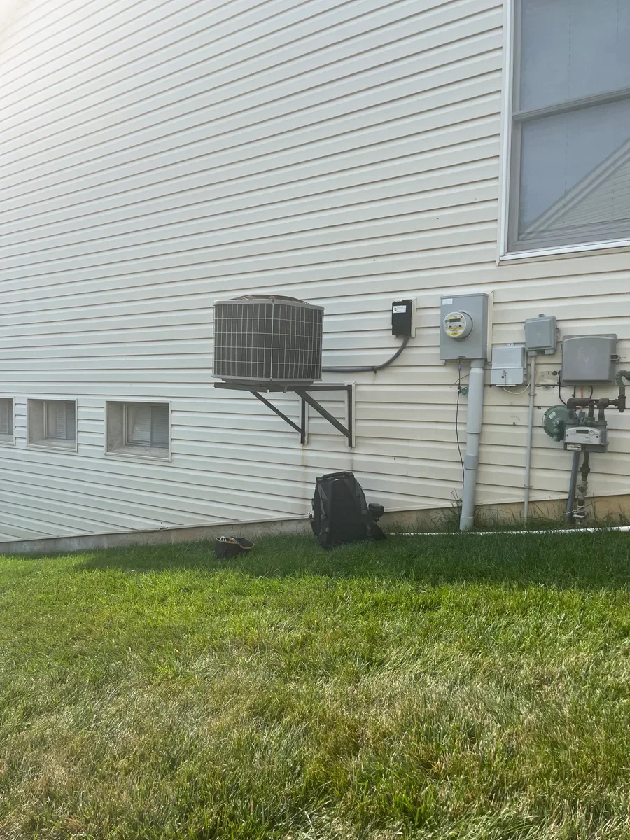 Outdoor air conditioner before replacement in O'Fallon, Missouri.