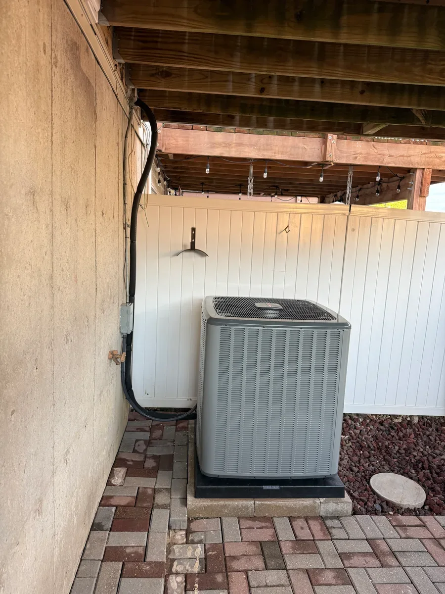 Outdoor heat pump after replacement in O'Fallon, Missouri.