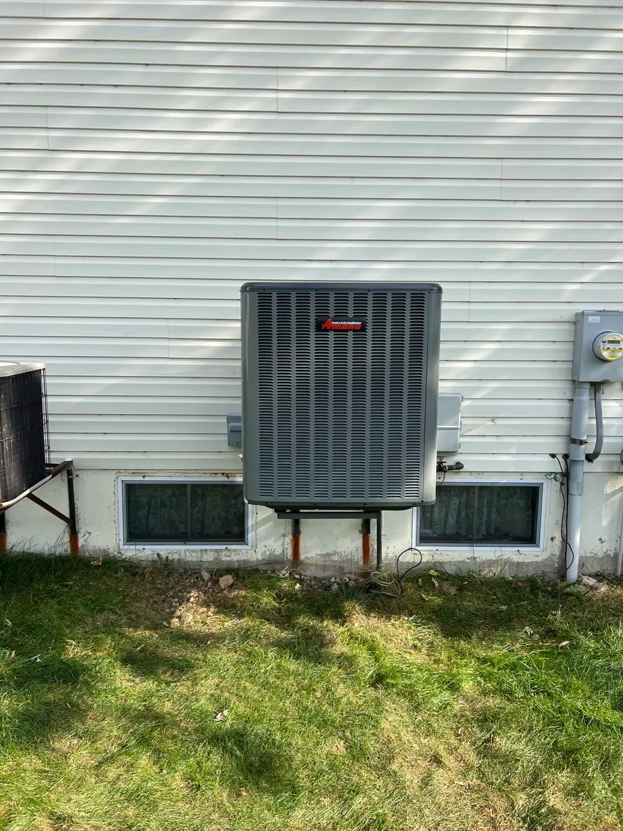 Outdoor air conditioner after replacement in O'Fallon, Missouri.