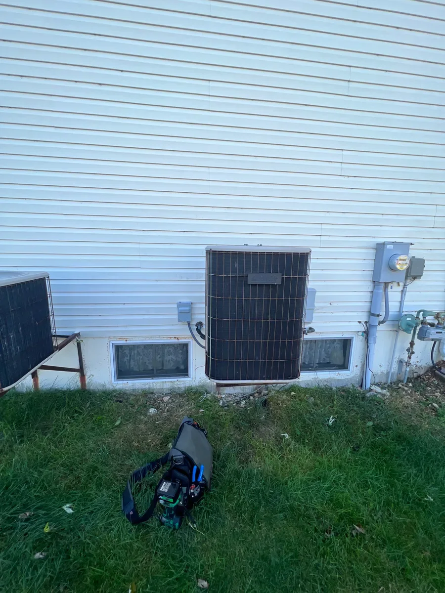 Outdoor air conditioner before replacement in O'Fallon, Missouri.
