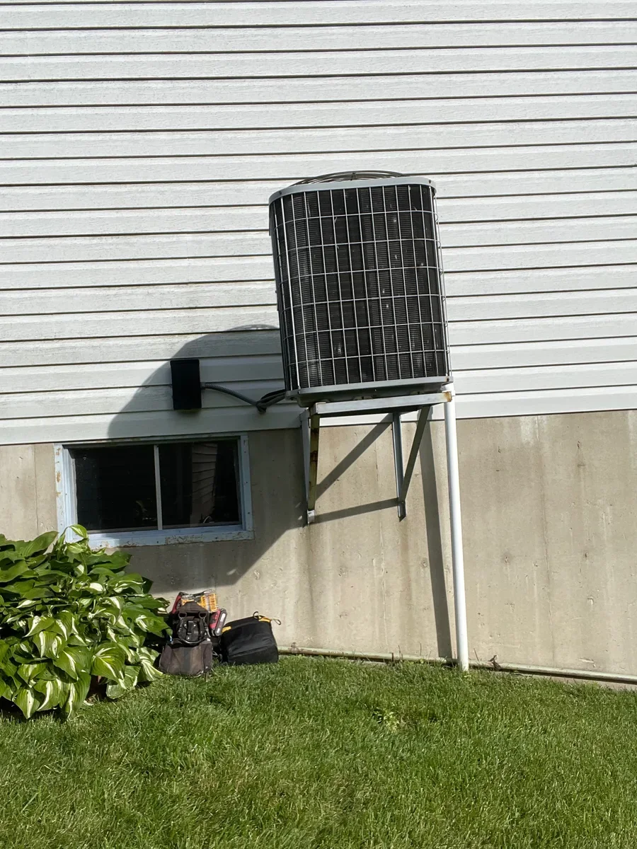 Outdoor air conditioner before replacement in O'Fallon, Missouri.