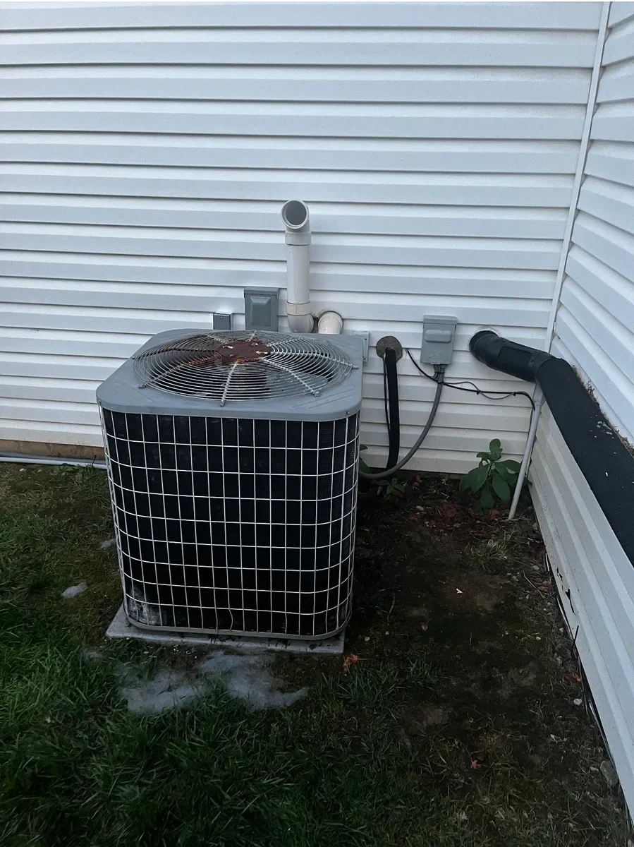 Outdoor air conditioner before replacement in O'Fallon, Missouri.