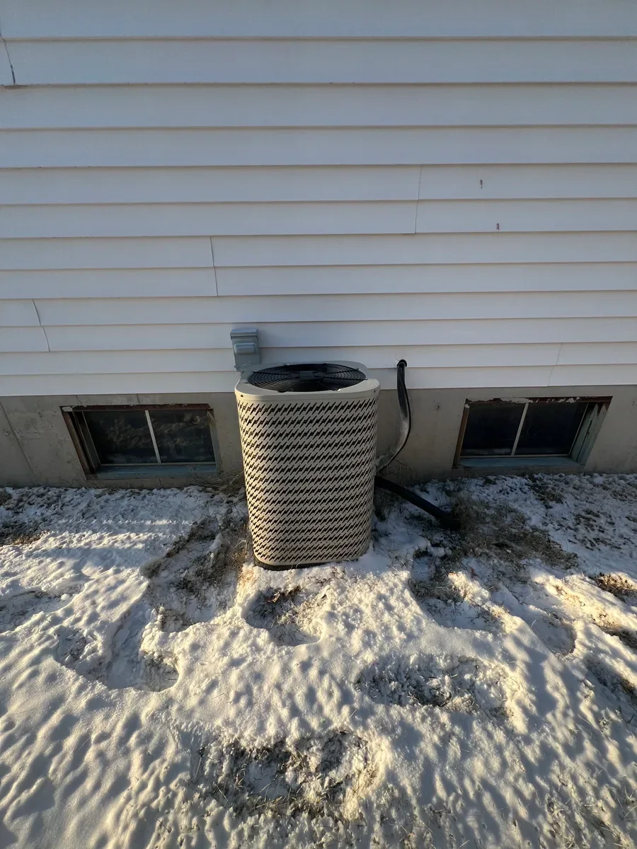 Outdoor air conditioner before replacement in O'Fallon, Missouri.