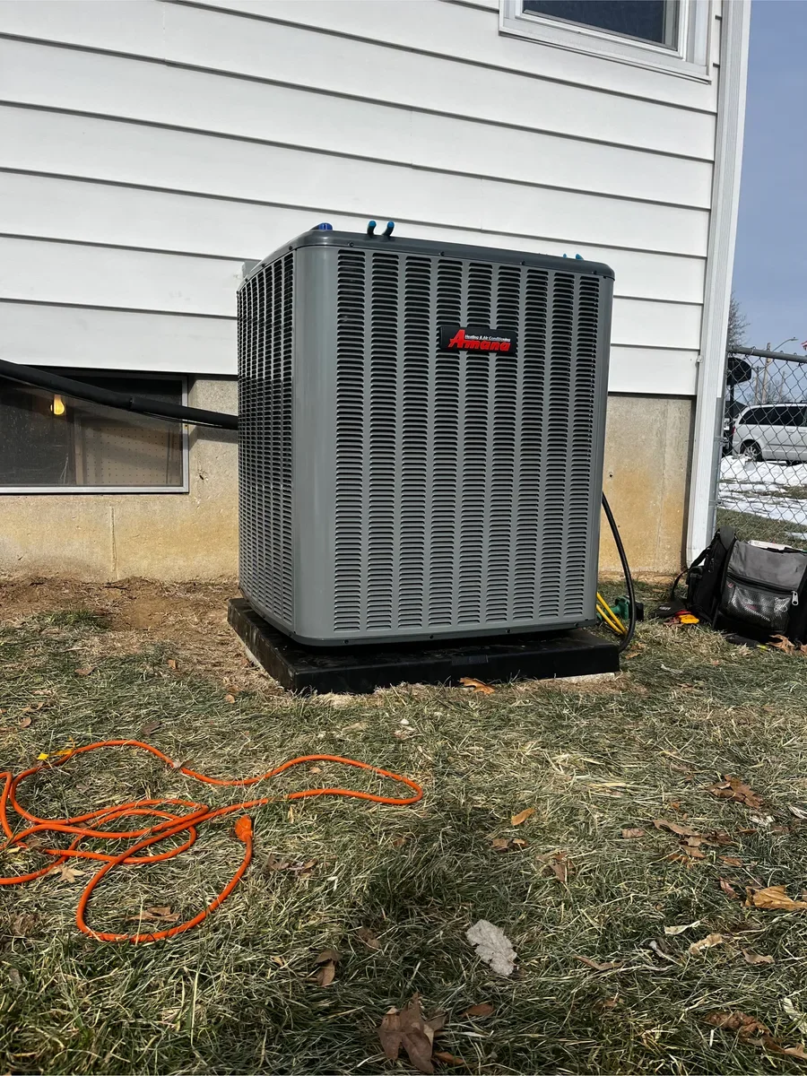 Completed outdoor equipment installed by KirbnJays for a heating and cooling system replacement in O'Fallon, Missouri.