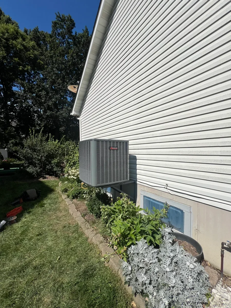 Completed outdoor equipment installed by KirbnJays for a heating and cooling system replacement in O'Fallon, Missouri.