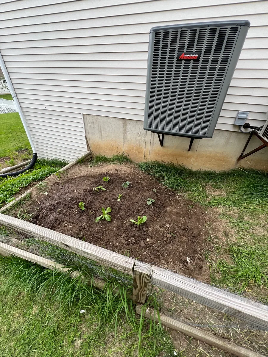 Completed outdoor equipment installed by KirbnJays for a heating and cooling system replacement in O'Fallon, Missouri.