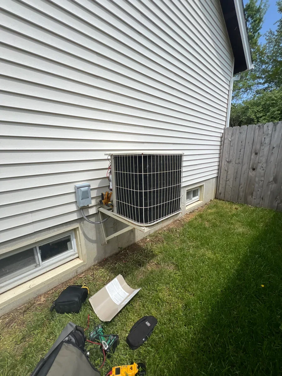 Outdoor equipment before a heating and cooling system replacement in O'Fallon, Missouri.