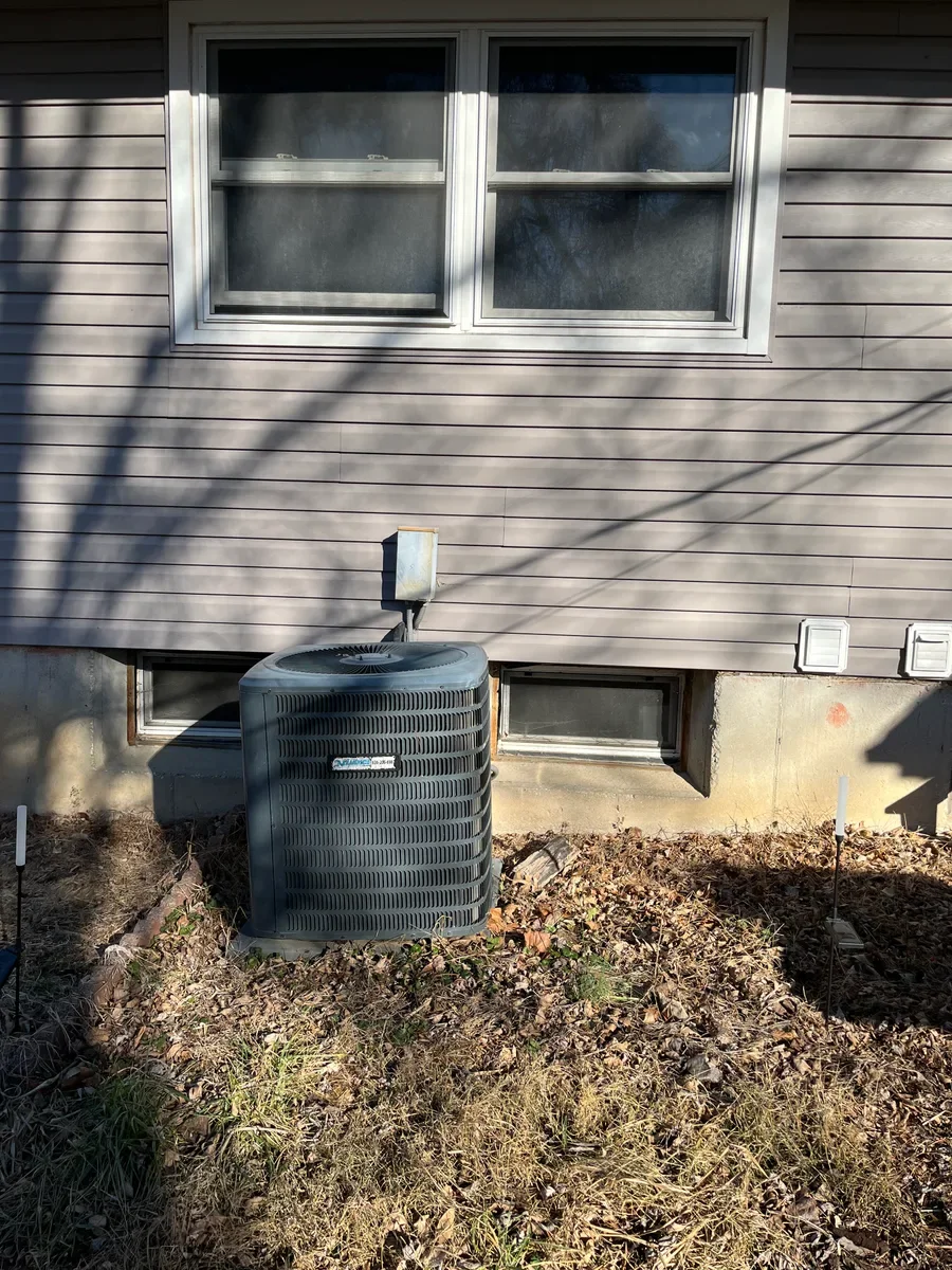 Outdoor air conditioner before replacement in St. Charles, Missouri.