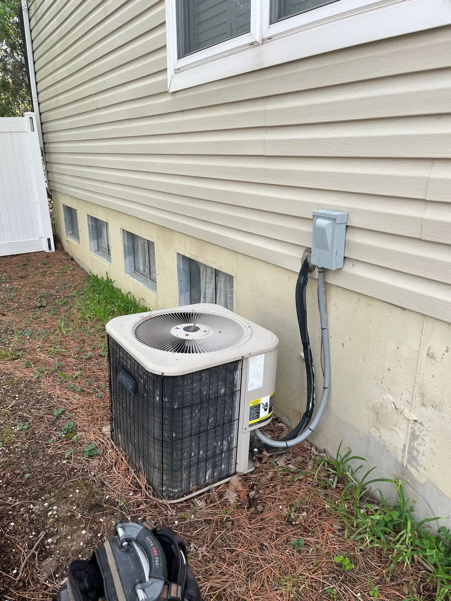 Outdoor air conditioner before replacement in St. Charles, Missouri.
