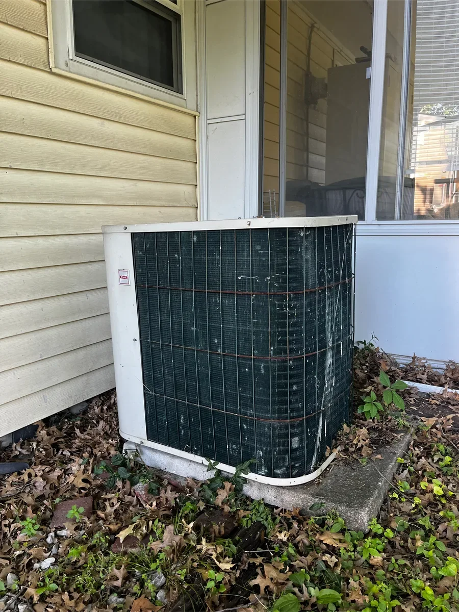 Outdoor air conditioner before replacement in St. Charles, Missouri.