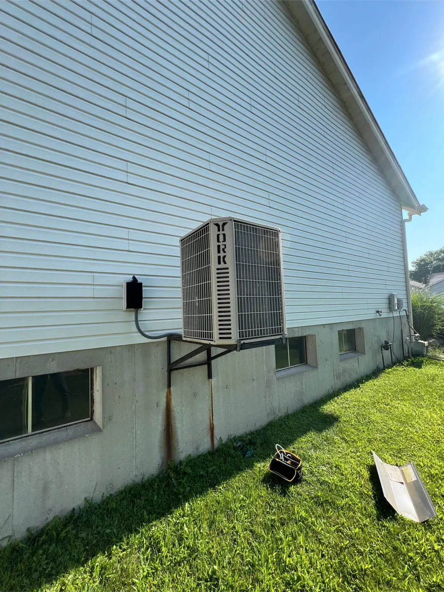 Outdoor air conditioner before replacement in St. Charles, Missouri.