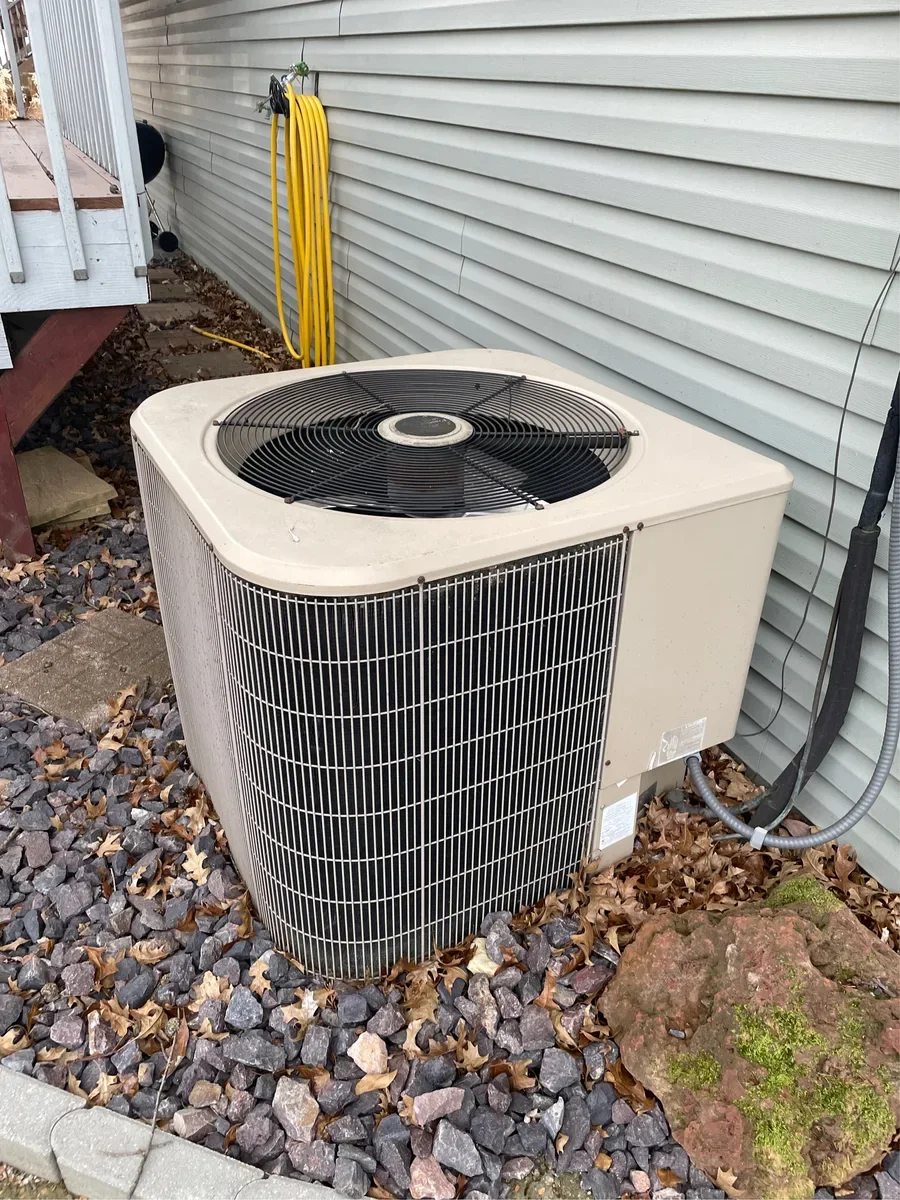 Outdoor air conditioner before replacement in St. Charles, Missouri.