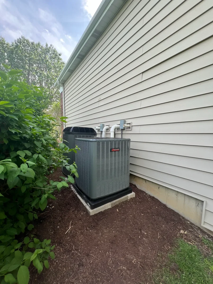Completed outdoor equipment installed by KirbnJays for a heating and cooling system replacement in St. Charles, Missouri.