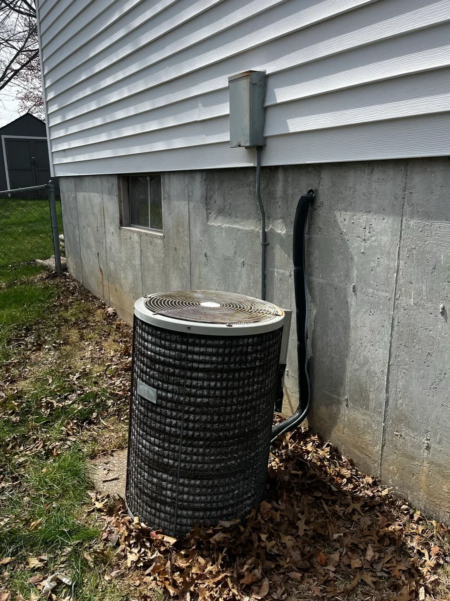 Outdoor air conditioner before replacement in St. Peters, Missouri.