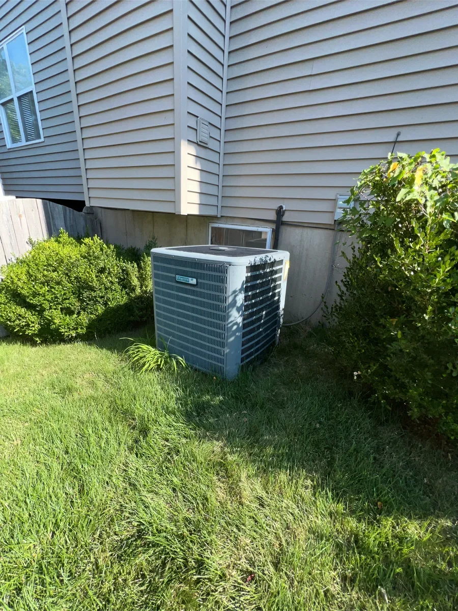 Outdoor air conditioner before replacement in St. Peters, Missouri.