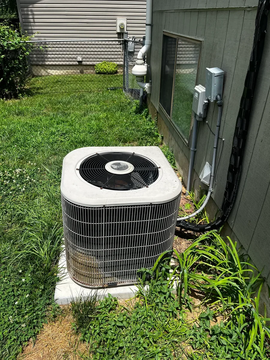 Outdoor air conditioner before replacement in St. Peters, Missouri.
