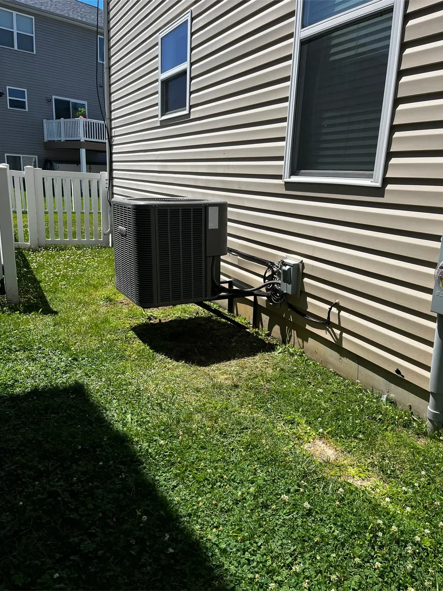 Outdoor air conditioner before replacement in St. Peters, Missouri.