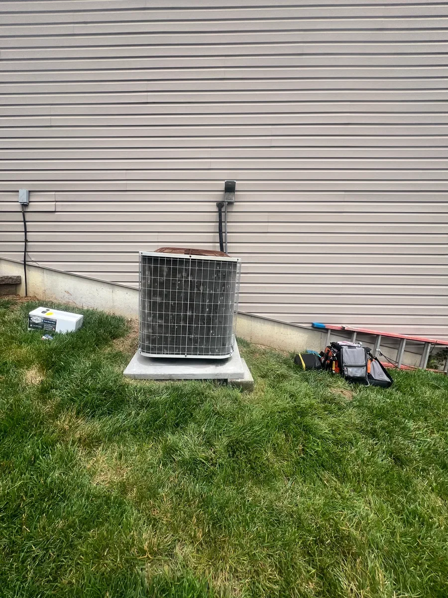 Outdoor air conditioner before replacement in Wentzville, Missouri.