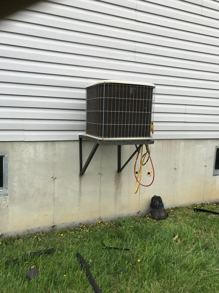 Outdoor air conditioner before replacement in Wentzville, Missouri.