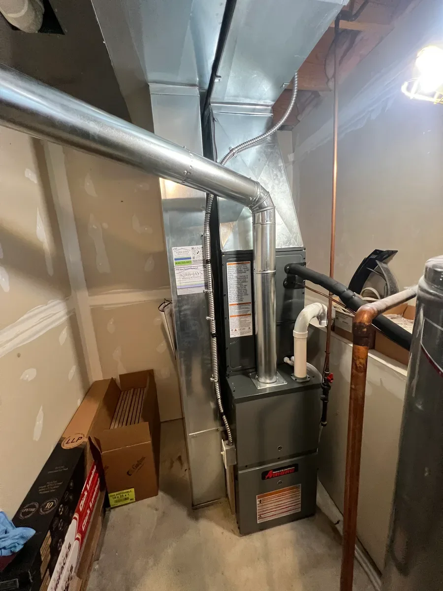 Completed indoor equipment installed by KirbnJays for a heating and cooling system replacement in Wentzville, Missouri.