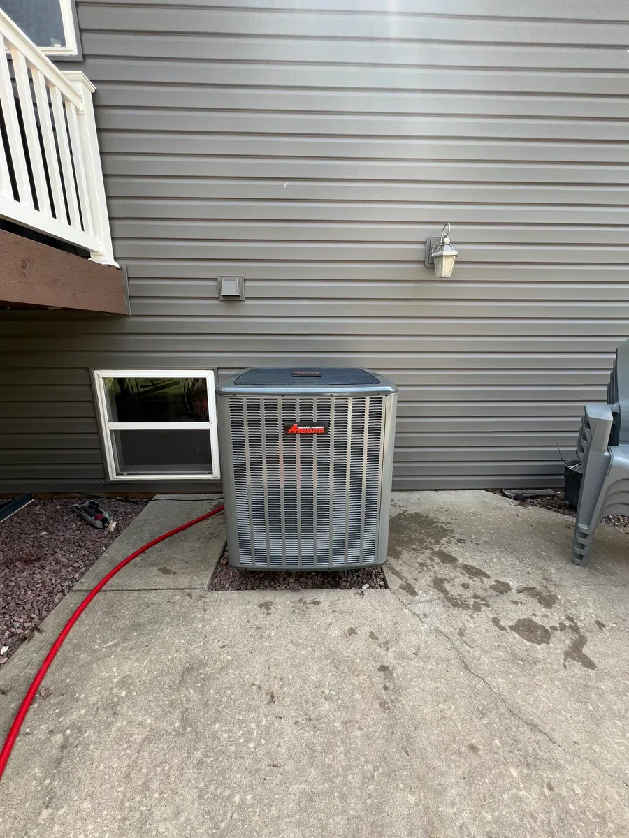 Completed outdoor equipment installed by KirbnJays for a heating and cooling system replacement in Wentzville, Missouri.